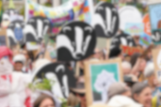 Photo of a march with campaign signs