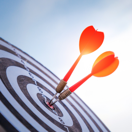 Photo of darts on a board