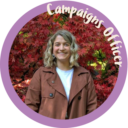 Photo of our campaigns officer with autumn leaves in the background. Purple frame and cream text saying 'campaigns officer'